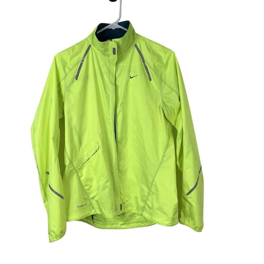 NIKE Women's StormFly Lightweight Reflective Rain Jacket Zest Neon Yellow M